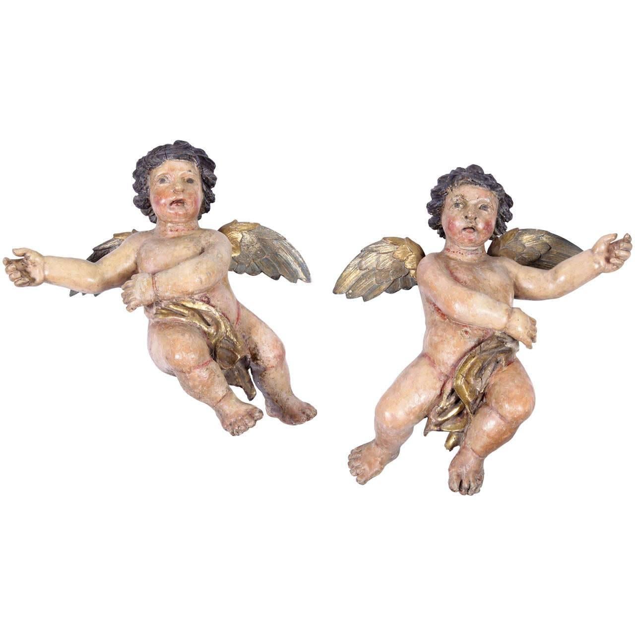 Pair of Early 18th Century Italian Carved Giltwood Polychrome Cherubs Sculptures