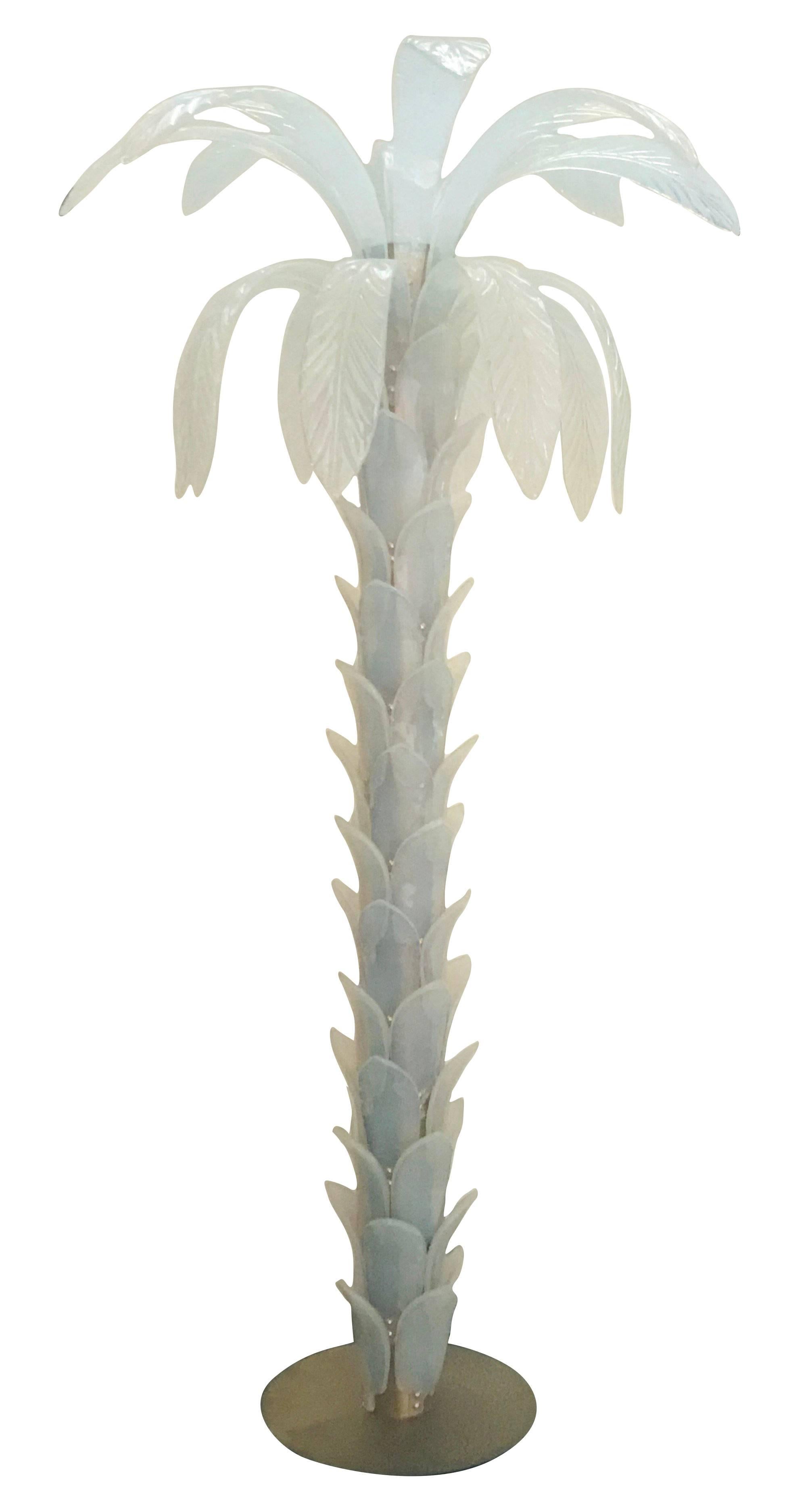 One of a kind and impressive opaline Murano glass palm tree floor lamp.
A pair available in stock in Palm Springs, price is for one item.
Measure: Height 80 inches
Leaves diameter 40 inches
Base diameter 18 inches
One central light socket
Can