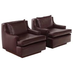 Pair of Low Arch Back Leather Lounge Club Chairs with a Solid Walnut Base