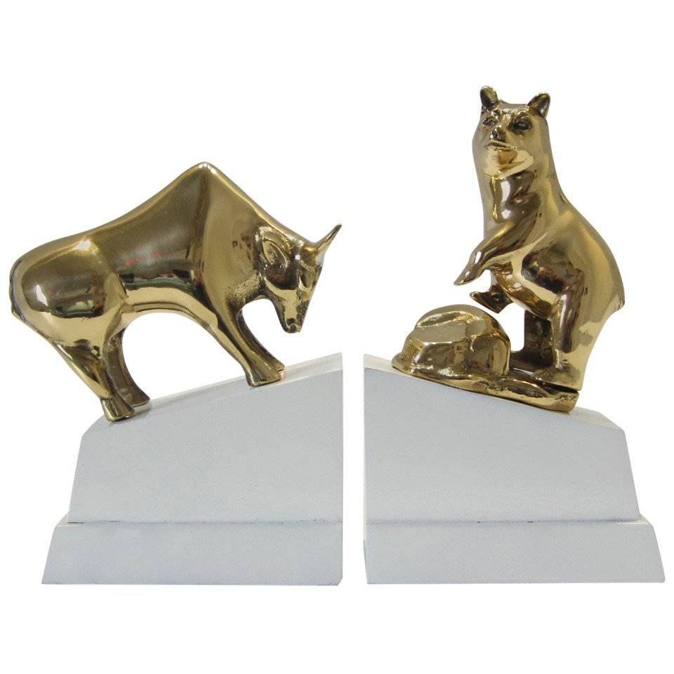Polished Brass Bull and Bear Bookends on Lacquered Blocks For Sale