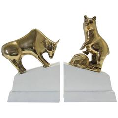 Vintage Polished Brass Bull and Bear Bookends on Lacquered Blocks
