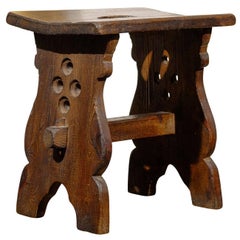 Spanish Oak Stool with Slopping Top and Handle from the Early 20th Century