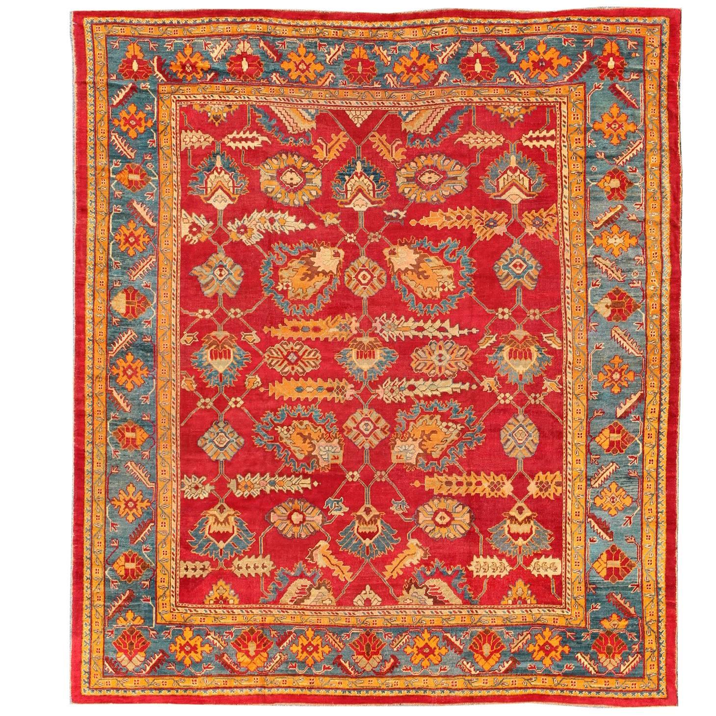 Antique Turkish Oushak Rug with Paisley Design in Red, Brown and Blue