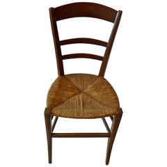 French 19th Century Country Ladder Back Side Chair With Rush Seat.