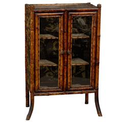 19th Century English Bamboo and Embossed Leather Vitrine/ Side Cabinet