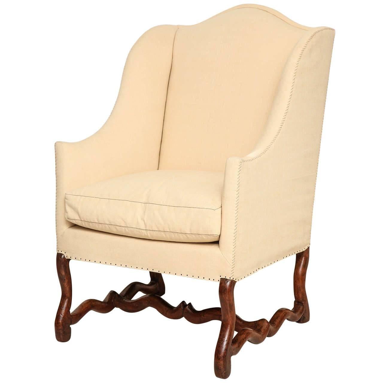18th Century French "OS De Mouton" Upholstered Walnut Wing Chair