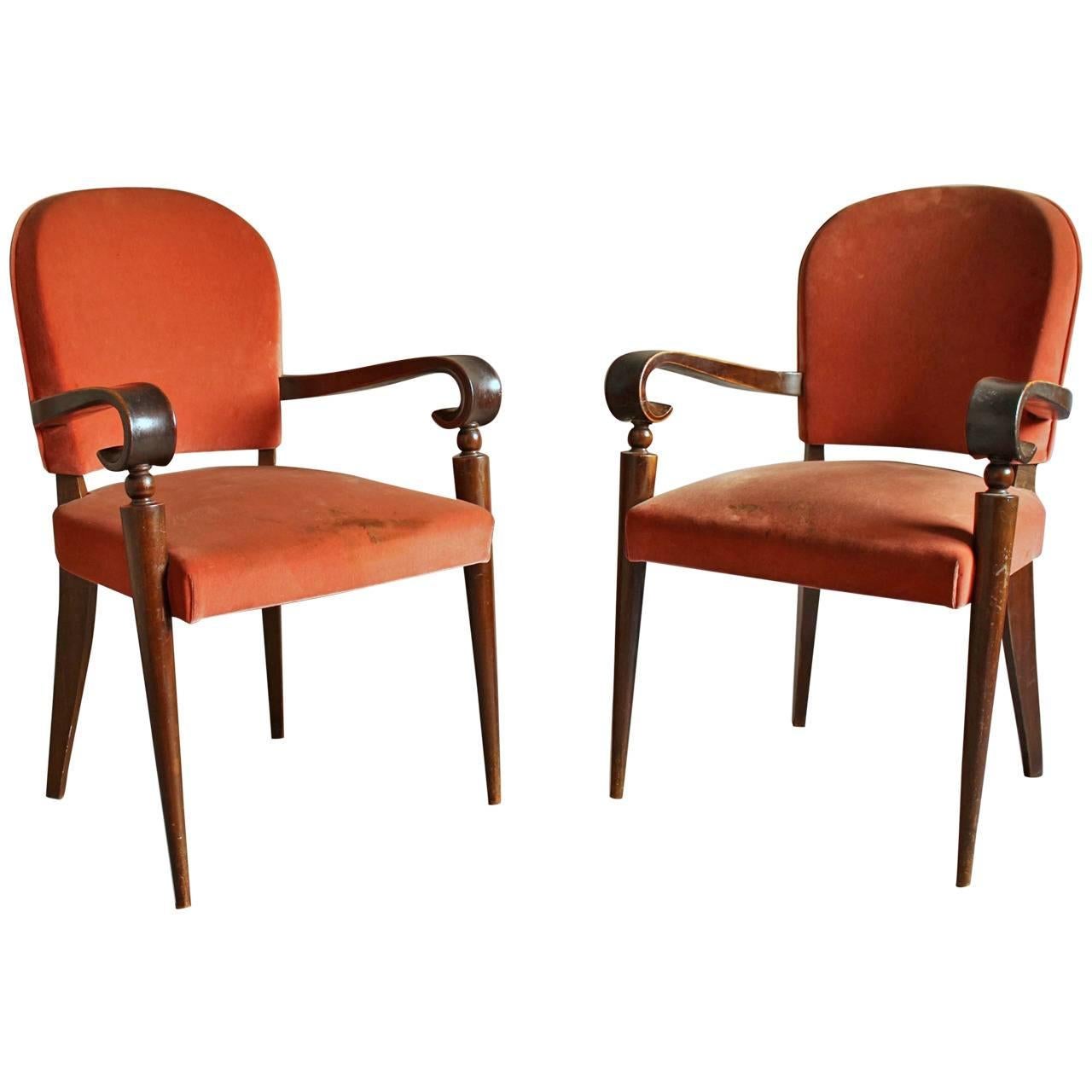 A Pair of Fine French Art Deco Ebonized Mahogany Arm Chairs by Maxime Old For Sale