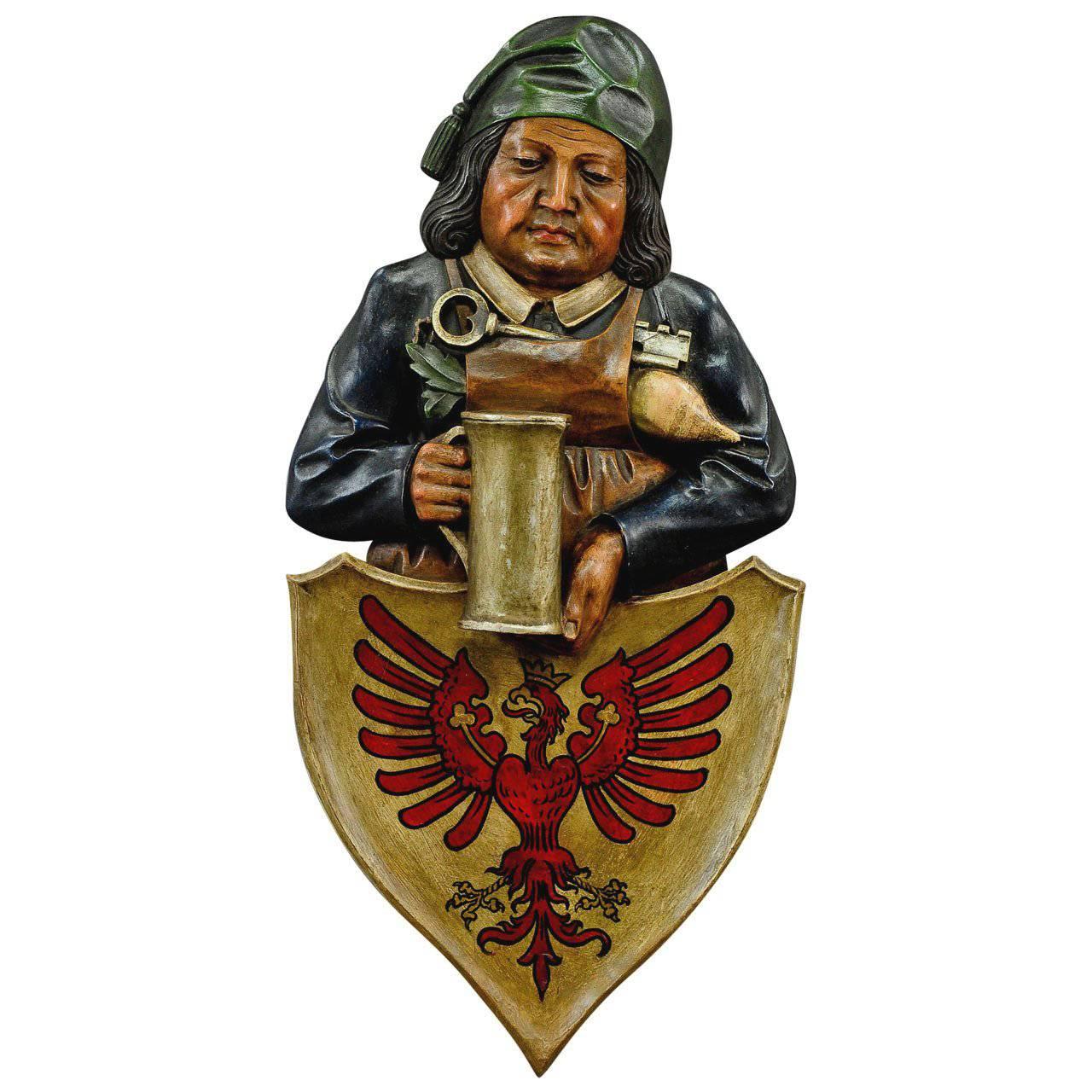 Folk Carved Wall Plaque of a Cellarer with Eagle Crest