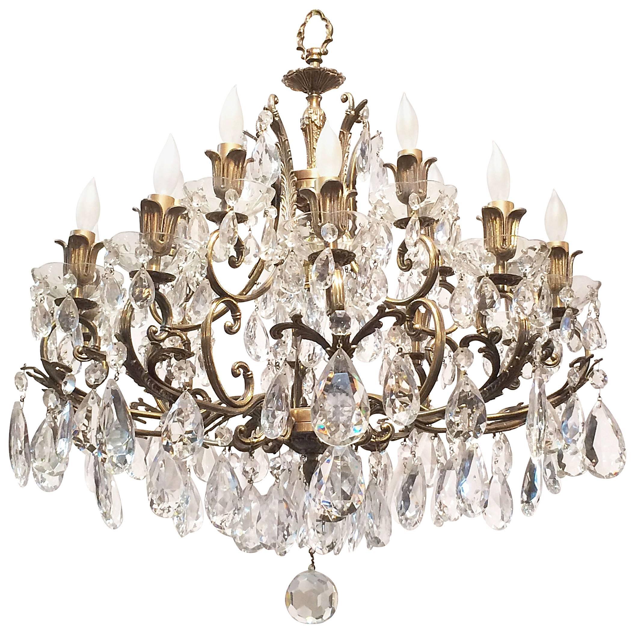 Continental Gilt Metal and Crystal Sixteen-Light Chandelier at 1stDibs