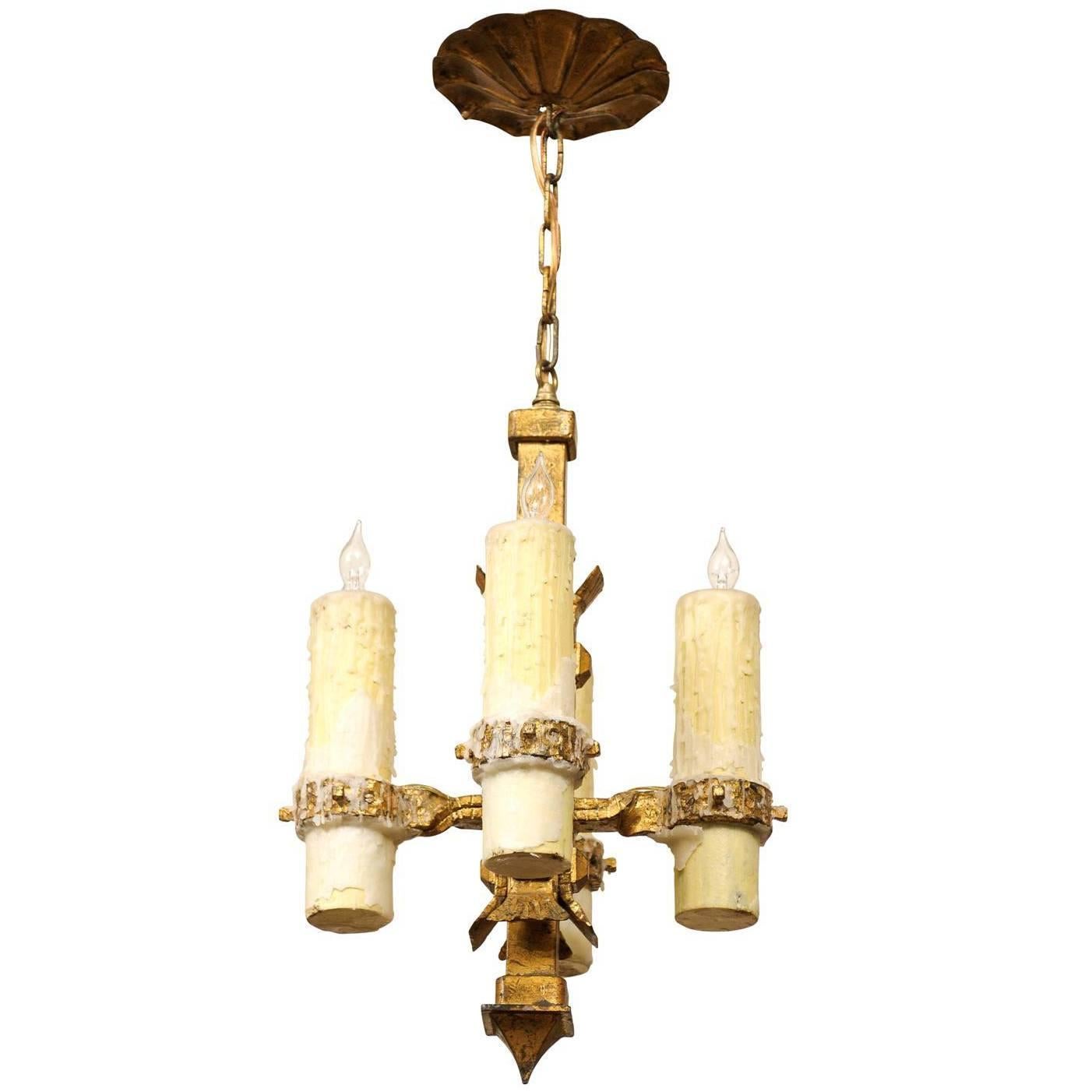 French Vintage Four-Light Gilt Iron Light Fixture with Large Wax Candles For Sale