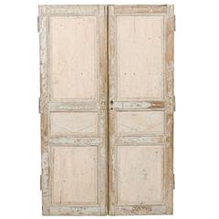 A Pair of Early 19th Century Painted French Wooden Doors A Pair of Early 19th Century Painted French Wooden Doors