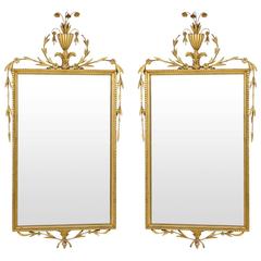 A Pair of Italian Early 20th Century Gilded And Carved Mirrors
