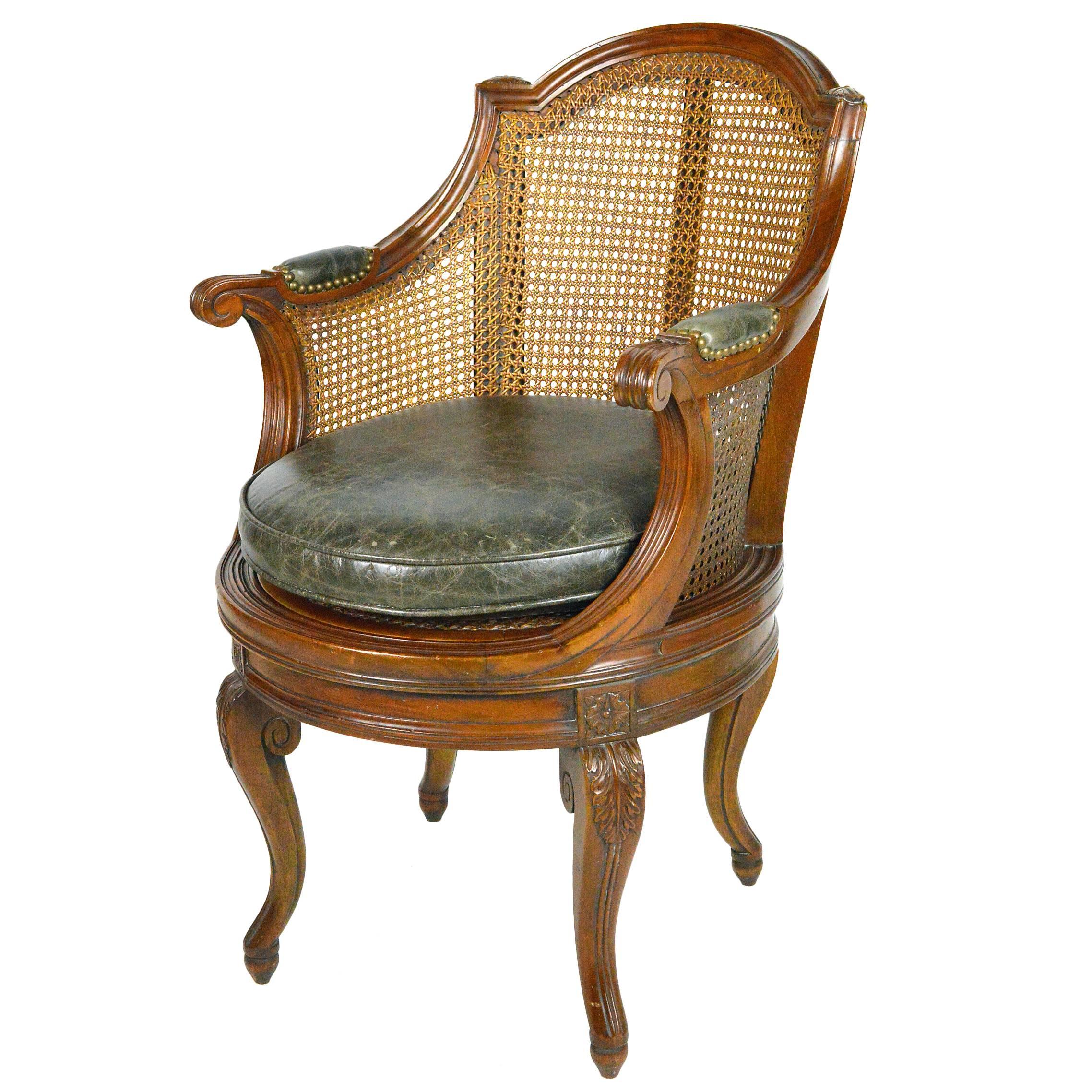 Louis XV Style Cane and Walnut Swivel Barrel Back Armchair For Sale