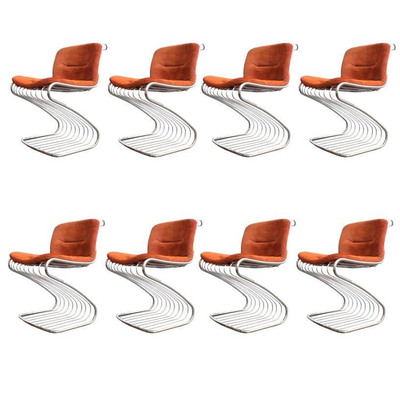 Set of 8 Chrome Cantilever Dining Chairs by Rima Rinaldi