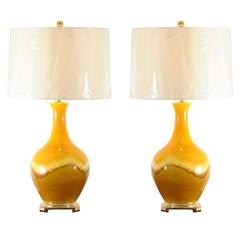 An Exceptional Pair of Yellow Ochre and Caramel Ceramic Lamps