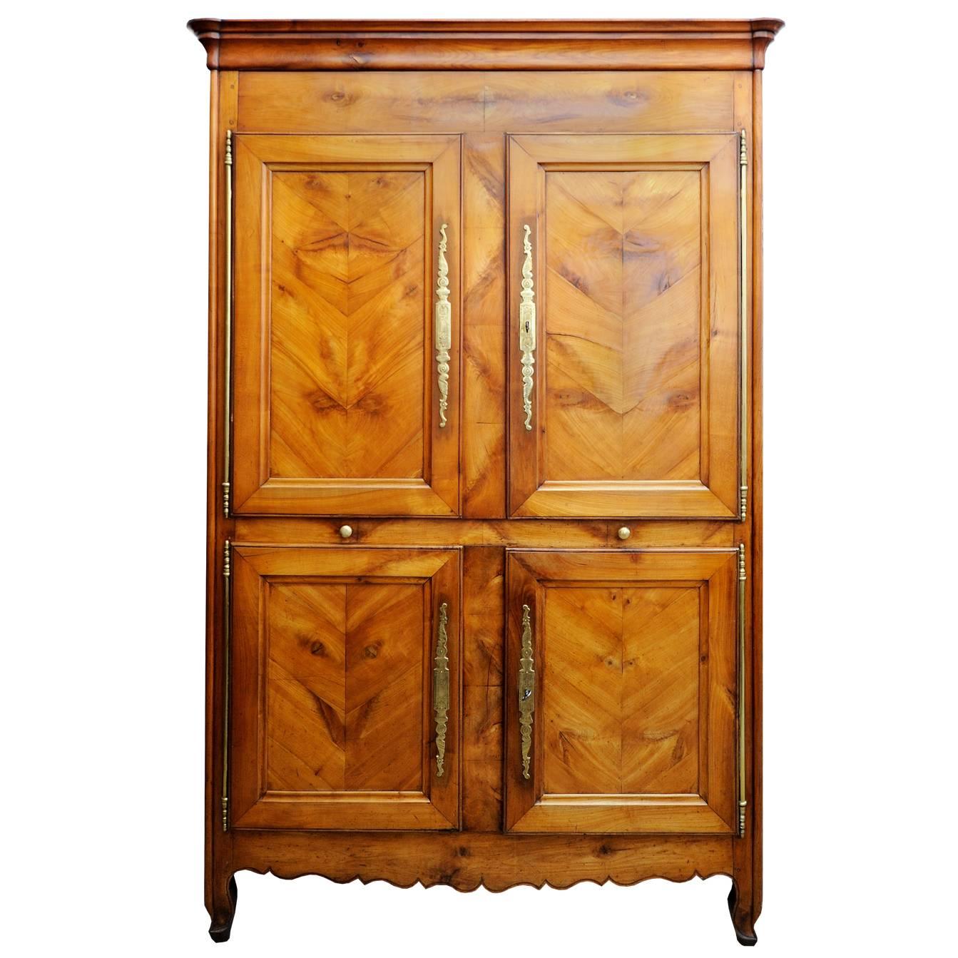 French, Louis XV, Mid-18th Century Four-Door Cherrywood Armoire Cupboard For Sale