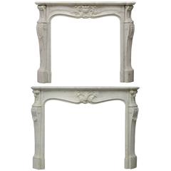 Elegant Pair Of 19th Century White Marble French Louis XV Fireplace Mantels