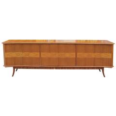 Monumental Italian Sideboard with Dentil Motif Base and Saber Legs