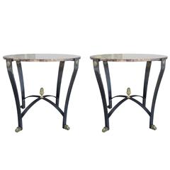 PAIR OF 20thC IRON 
BRONZE GUERIDON TABLES WITH STONE TOPS