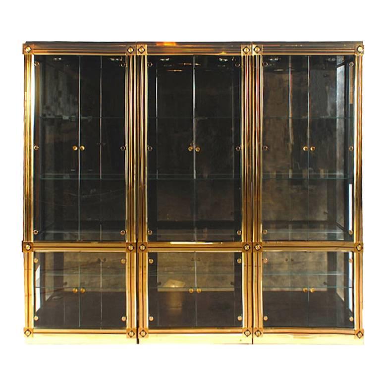 Three Mastercraft Empire Revival Brass and Black Vitrines