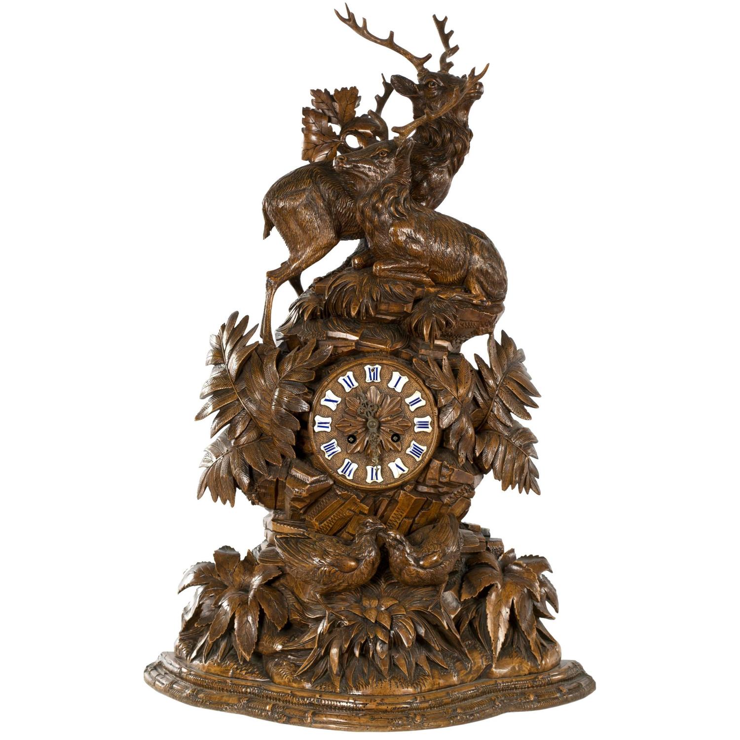 A Large Black Forest Mantel Clock with Red Stags and Game Birds at 1stdibs