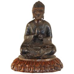 Cast Bronze Temple Figure on Carved Walnut Lotus Leaf Base