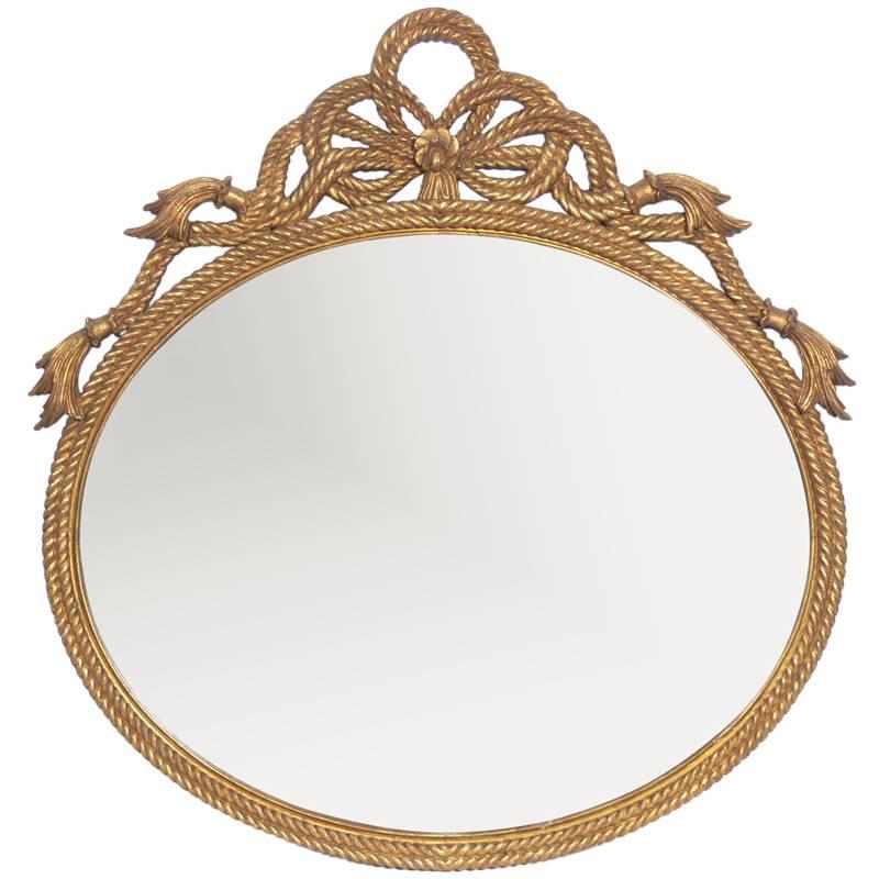 Miroir en corde sculpté et doré, vers les années 1940  en vente