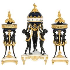 Marble Mounted Gilt and Patinated Bronze Three-Piece Clock Set by H. Dasson