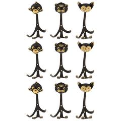 Nine Walter Bosse Coat Wall Hooks Brass, Monkey Lion Cat, Austria, 1950s