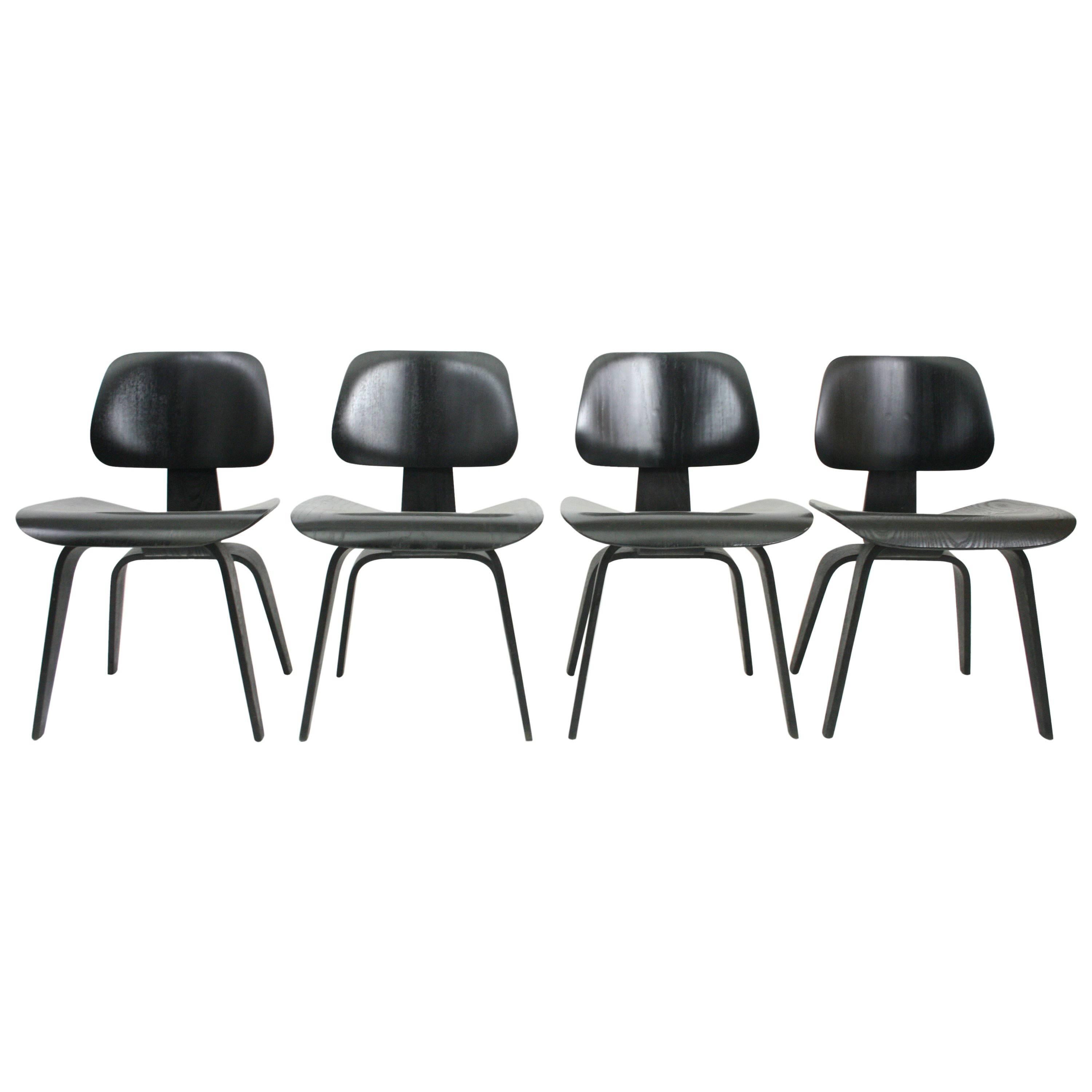 Set of Four Early DCW Chairs by Eames for Evans Products