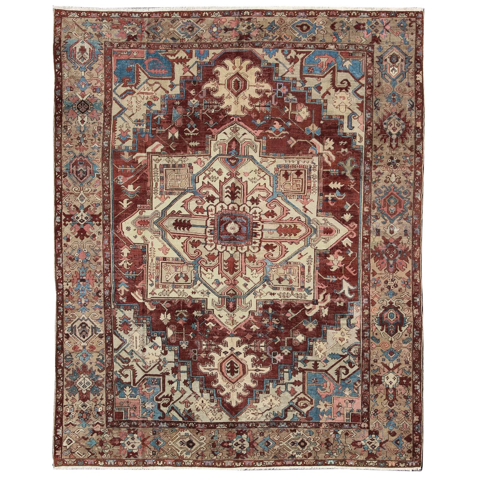 Antique Persian Serapi Carpet With Medallion In Reddish Brown Tan and Light Blue For Sale
