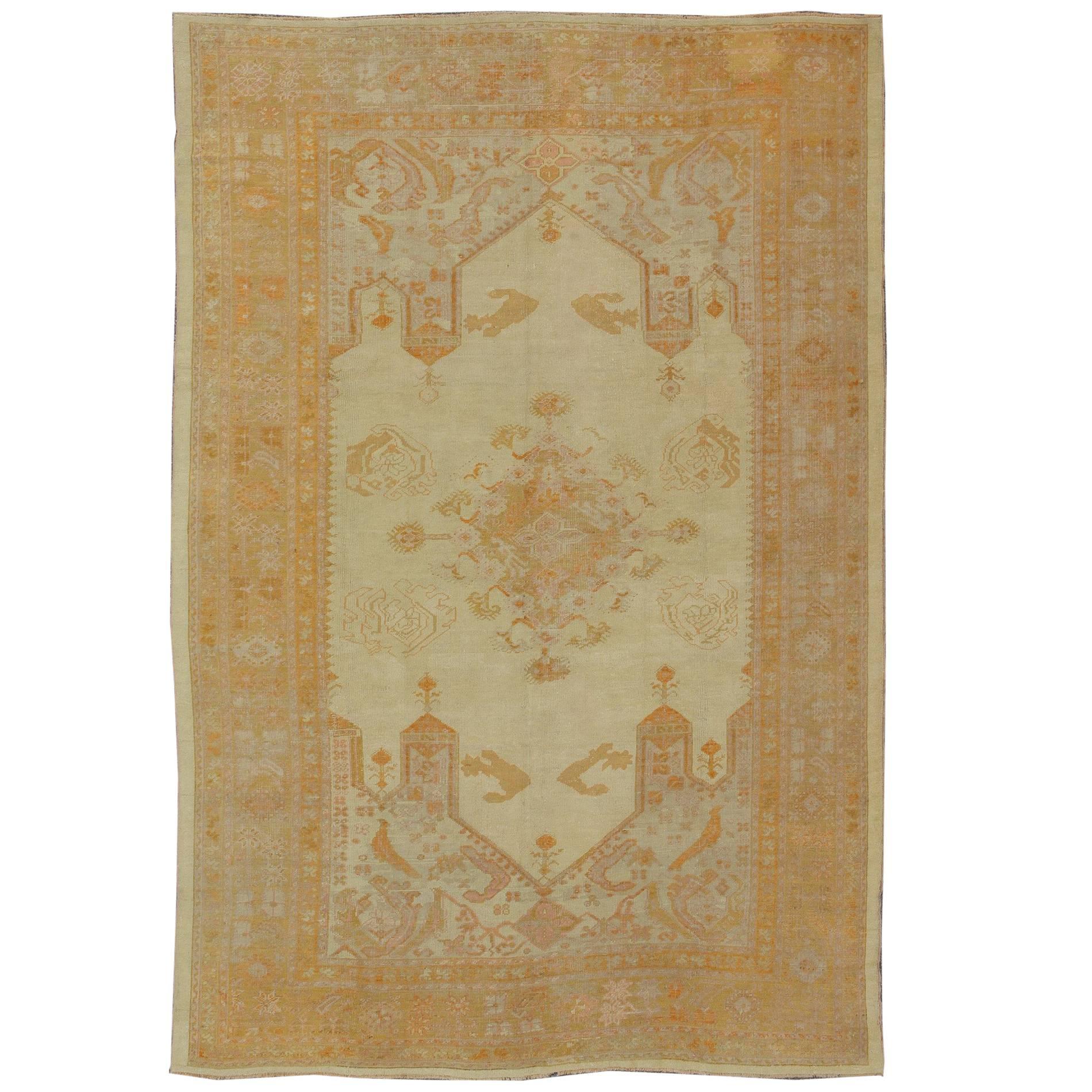 Antique Turkish Oushak Rug with Geometric in Cream, Lavender, Green and Orange