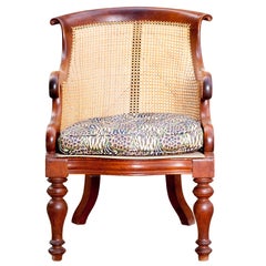 A pair of English Mahogany Antique Caned Chairs