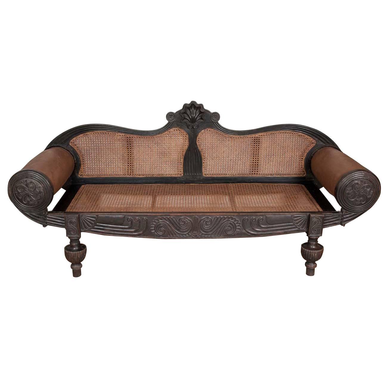 19th Century Ebonised Carved Ceylonese Settee For Sale