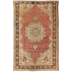 Antique Oushak Medallion Rug in Rose, Pale Green, Light Blue, Gold and Brown 