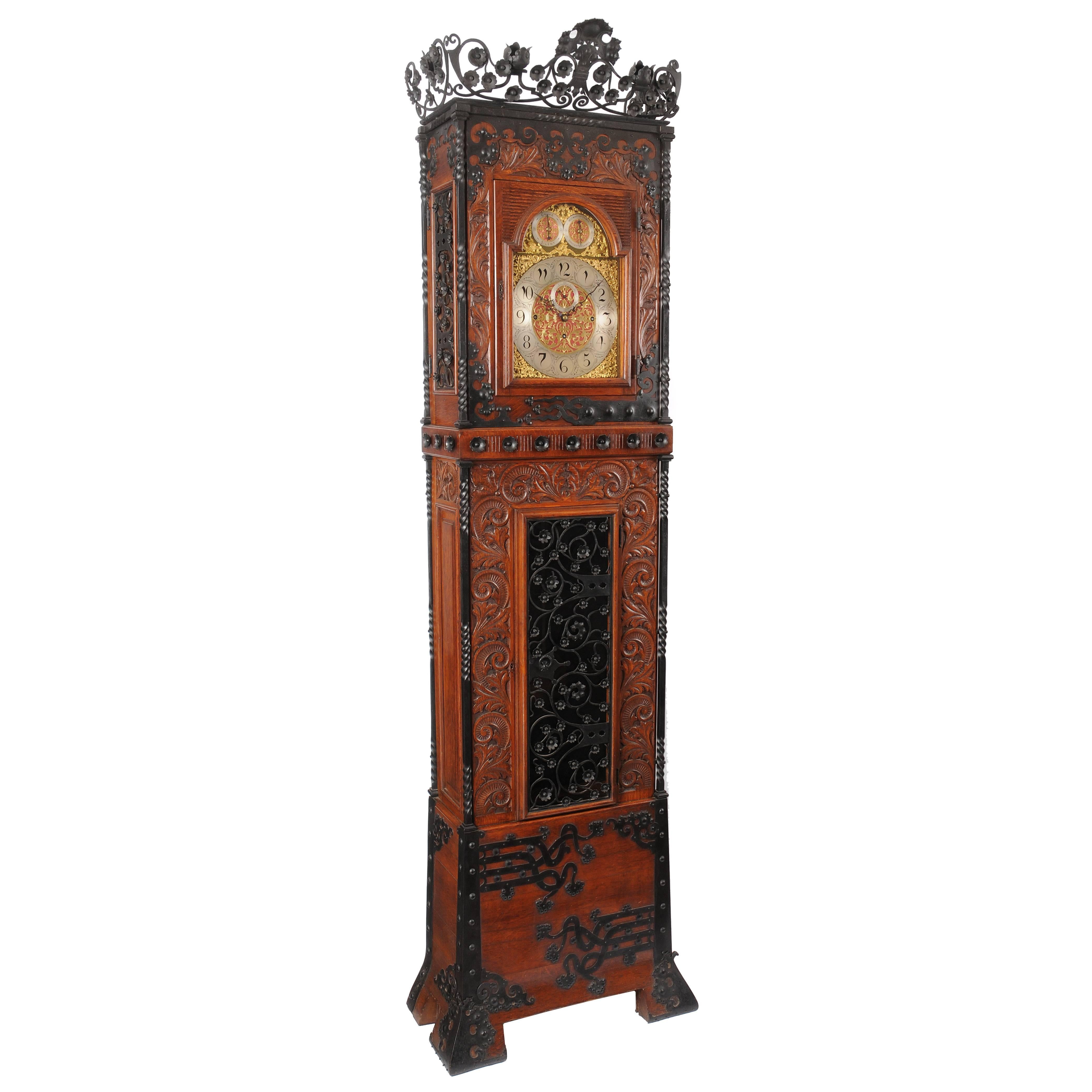 Tall Aesthetic Movement Oak and Wrought Iron Case Clock For Sale