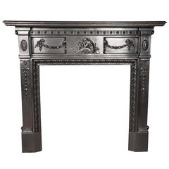 Antique Neoclassical Polished Cast Iron Fireplace Surround