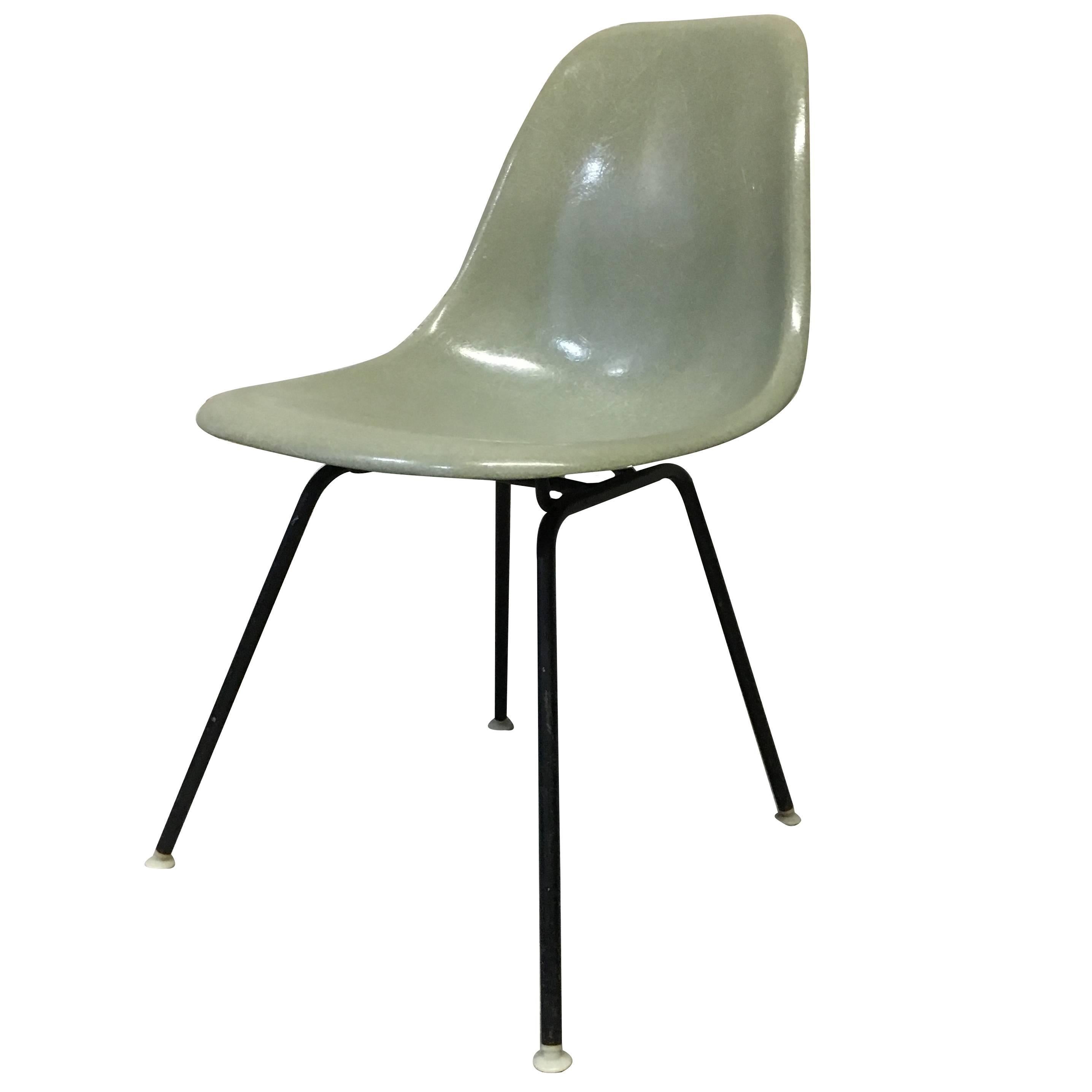 Set of four Herman Miller seafoam green fiberglass side chair (model DSX). Black H base with white nylon glides. Other bases available (Eiffel, dowel, rocker, low rod).