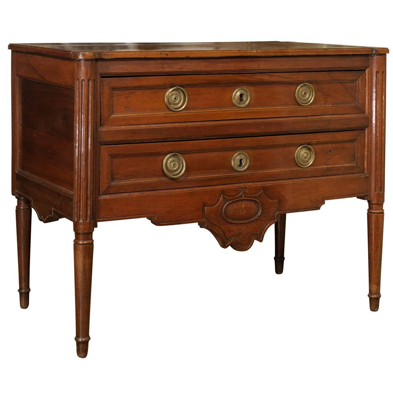 French Louis XVI Style Walnut Two-Drawer Commode With Cartouche Motif For Sale
