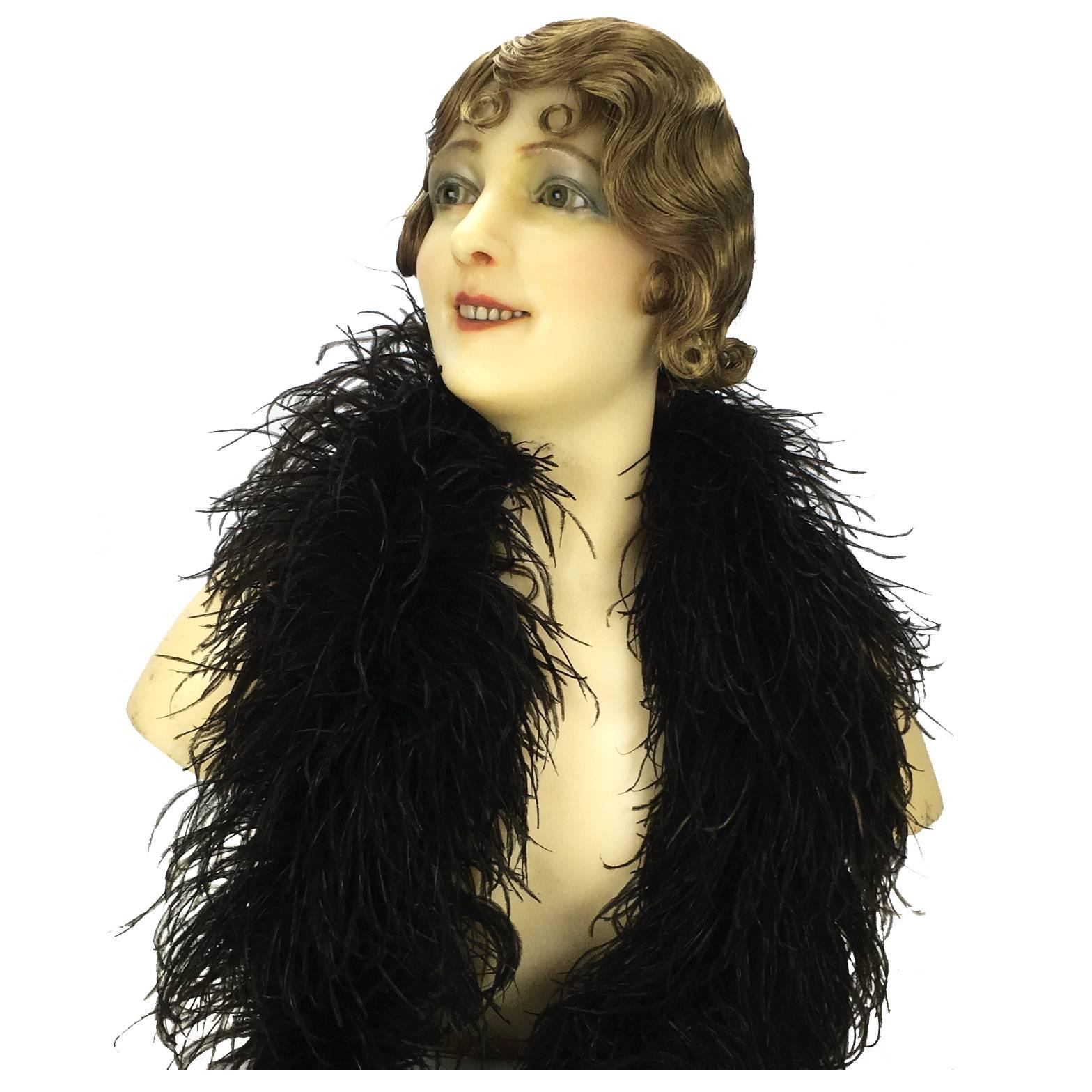 A stunning antique French wax mannequin bust, once part of a full size mannequin, probably used to show beautiful clothing in the fancy Parisian fashion stores. She has a beautiful 