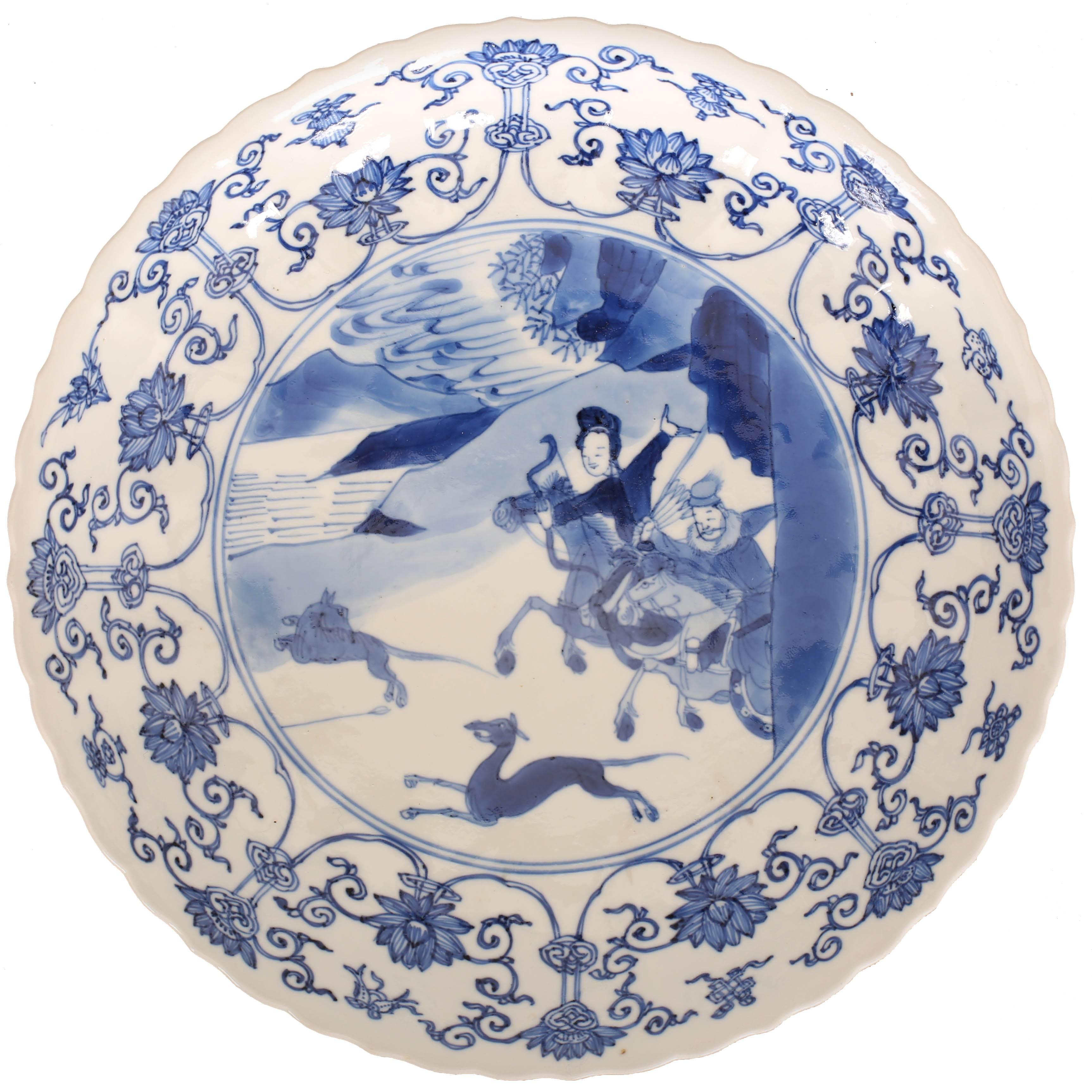 Chinese Porcelain Blue and White Saucer Dish with Hunting Scene, 17th Century For Sale