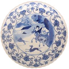 Chinese Porcelain Blue and White Saucer Dish with Hunting Scene, 17th Century