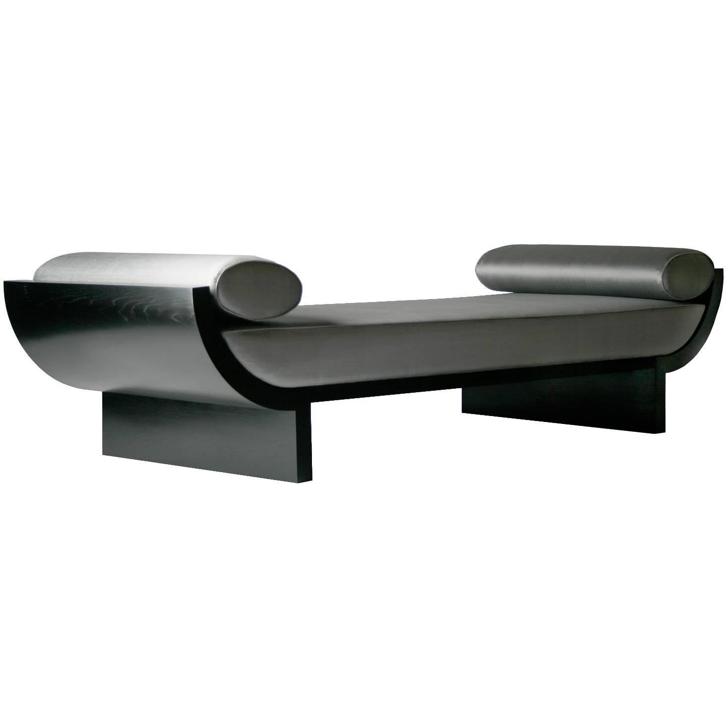 Modern Day Bed upholstered with oval bolsters For Sale at 1stDibs