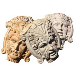 Set of Four Large Neoclassical Style Iron Masks