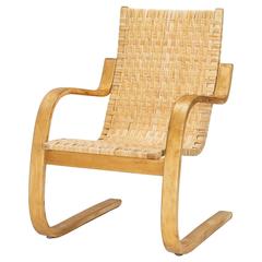 Alvar Aalto Cantilever Chair 406 by Artek in Birch and Cane Webbing