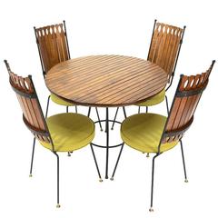 Used Iron and Maple Dining Set by Arthur Umanoff