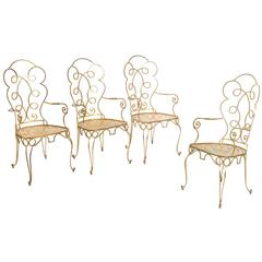 Chairs in the Style of Gilbert Poillerat, France, gilded metal.