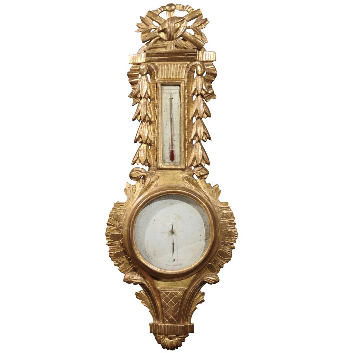French Mid 19th Century Louis XVI Style Giltwood Barometer with Carved Crest