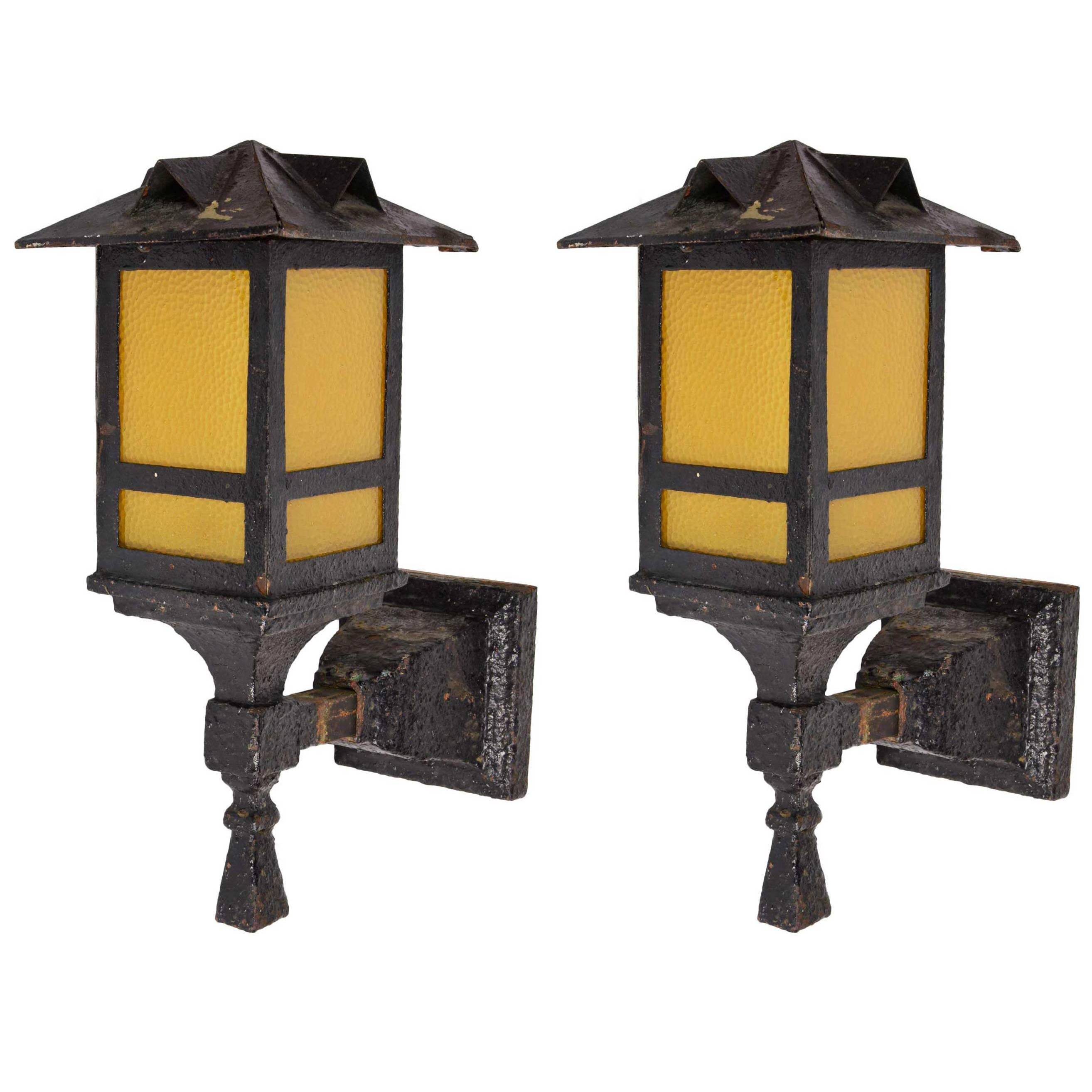Original Iron Arts & Crafts Exterior Sconce Pair with Hammered Amber Glass For Sale
