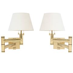 Pair of Exceptional Swing Arm Wall Lamps by Karl Springer